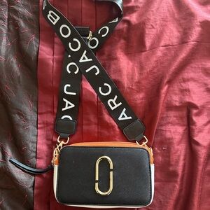 Insp Ired Black and Orange Crossbody Bag